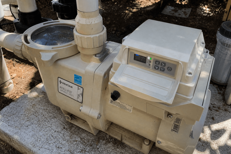 A variable-speed pool pump on an equipment pad