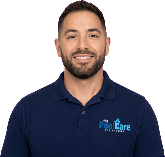 The owner of Pool Care LA in a branded polo