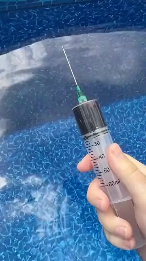 Dye pulled straight into a gusher underwater