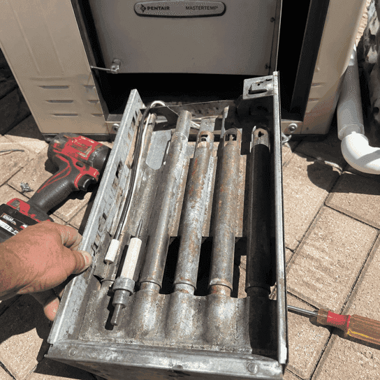 Before: the burner tray pulled out