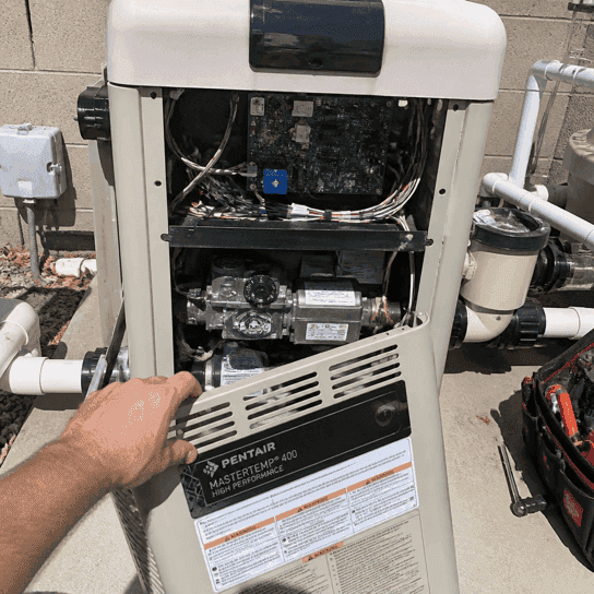 A pool heater opened at the control board