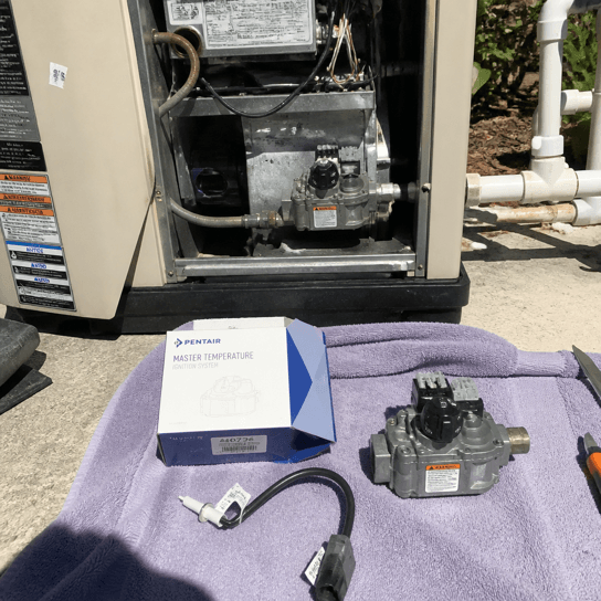 A new igniter and gas valve before fitting