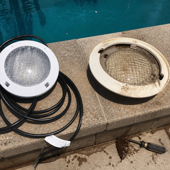 A new LED light beside the old fixture
