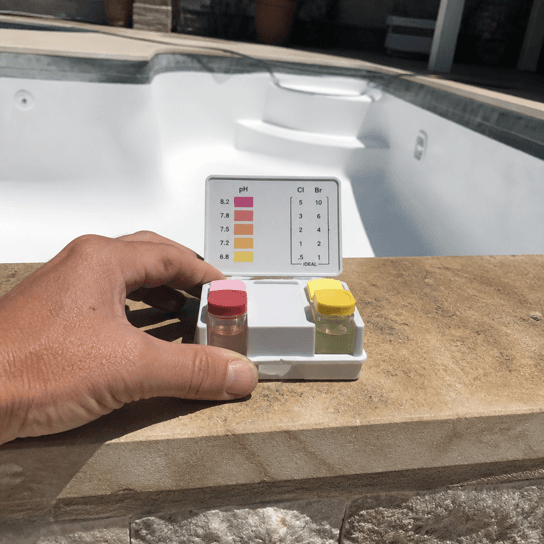 Testing water on a newly plastered pool